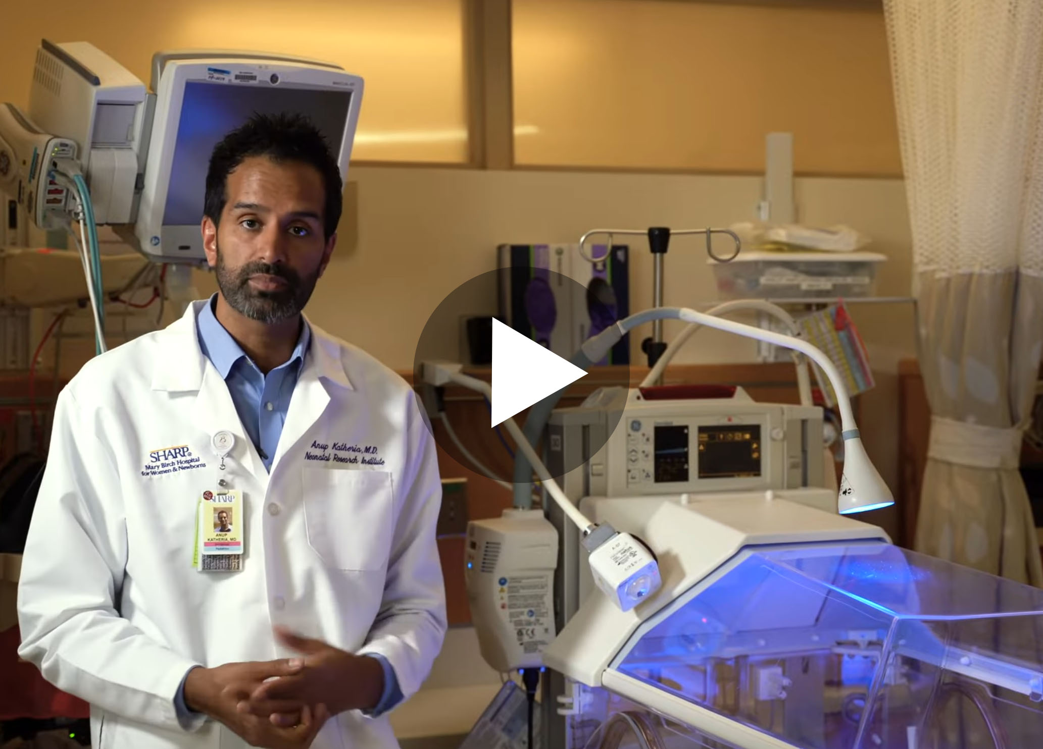 Doctor Giving Tour of NICU room